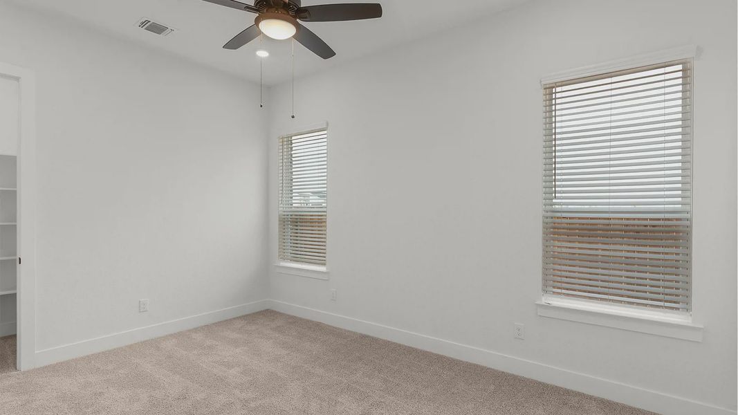 Representative unfurnished interior of a home built from the Drios by Chesmar Homes in Crescent Bluff, Georgetown (Image 16).