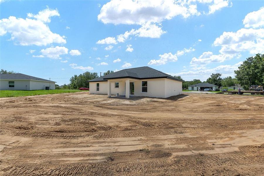 Front exterior of a new home in , Ocala, FL, highlighting curb appeal (Image 40). Front exterior of a new home in , Ocala, FL, highlighting curb appeal (Image 40).