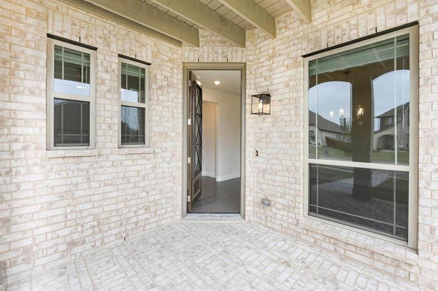 Exterior details and patio area of a home in Triple Diamond Ranch, Mansfield (Image 25).