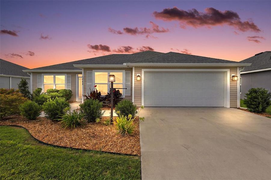 Front exterior of a new home in , The Villages, FL, highlighting curb appeal (Image 2). Front exterior of a new home in , The Villages, FL, highlighting curb appeal (Image 2).
