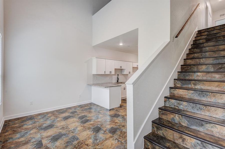 Stairs with tile patterned flooring