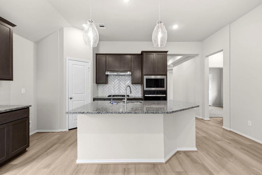 Furnished interior view inside a new home in Grand Central Park, Conroe (Image 5).