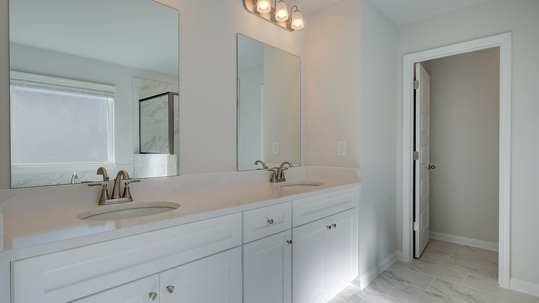 Furnished interior view inside a new home in Westwind Estates, Hampton (Image 27).