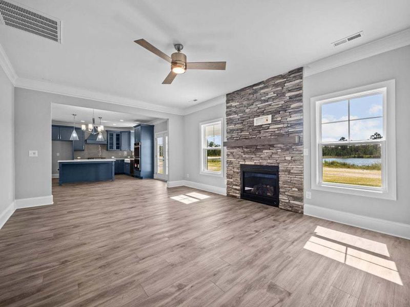 Great Room with Fireplace with Stone Surround Option Great Room with Fireplace with Stone Surround Option