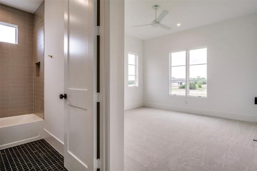 Full bath featuring recessed lighting, a ceiling fan, baseboards, and bathing tub / shower combination
