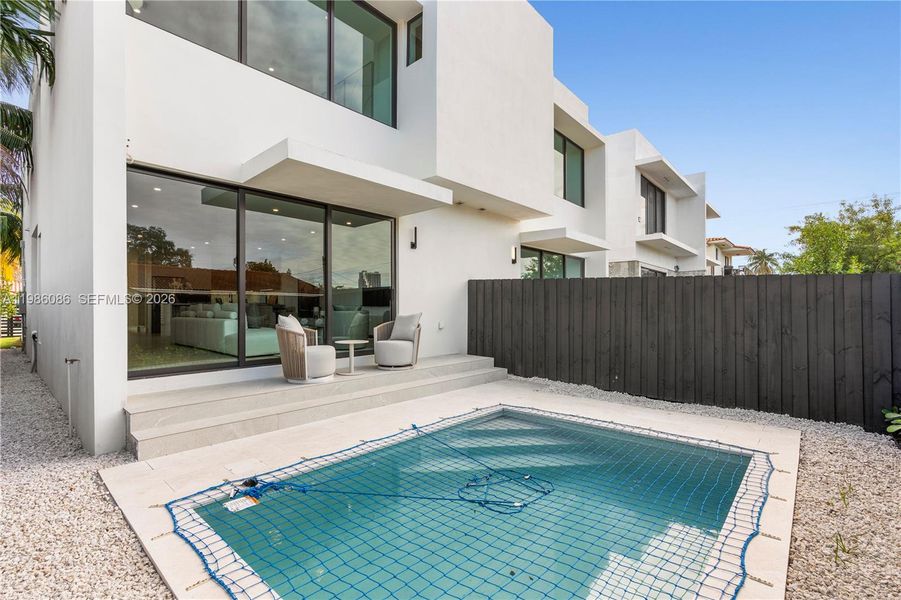 Exterior details and patio area of a home in , Miami (Image 31). Exterior details and patio area of a home in , Miami (Image 31).