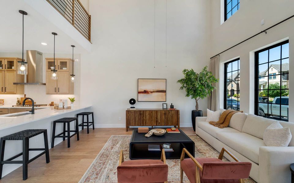 Representative furnished interior of a home built from the Rainier by CastleRock Communities in The Summit at Center Stage, Keller (Image 5).