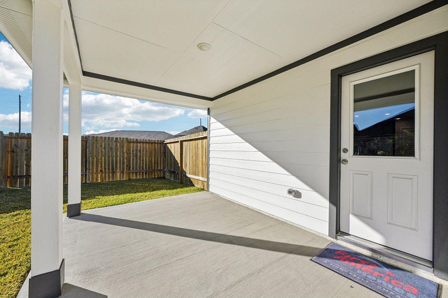 Exterior details and patio area of a home in The Landing, New Caney (Image 3).