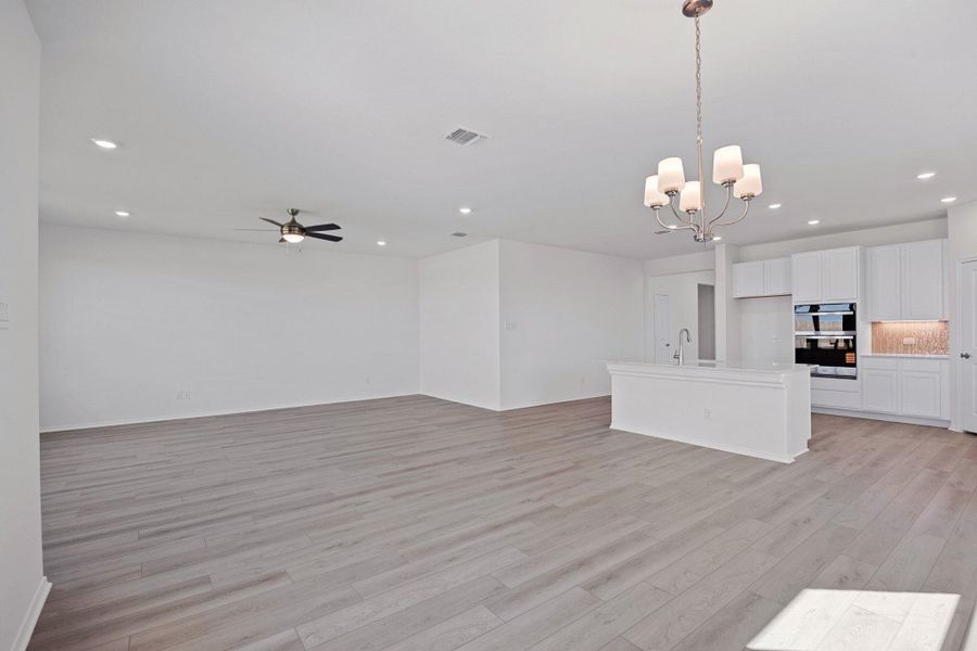 Furnished interior view inside a new home in Salerno - Classic Collection, Round Rock (Image 5). Furnished interior view inside a new home in Salerno - Classic Collection, Round Rock (Image 5).