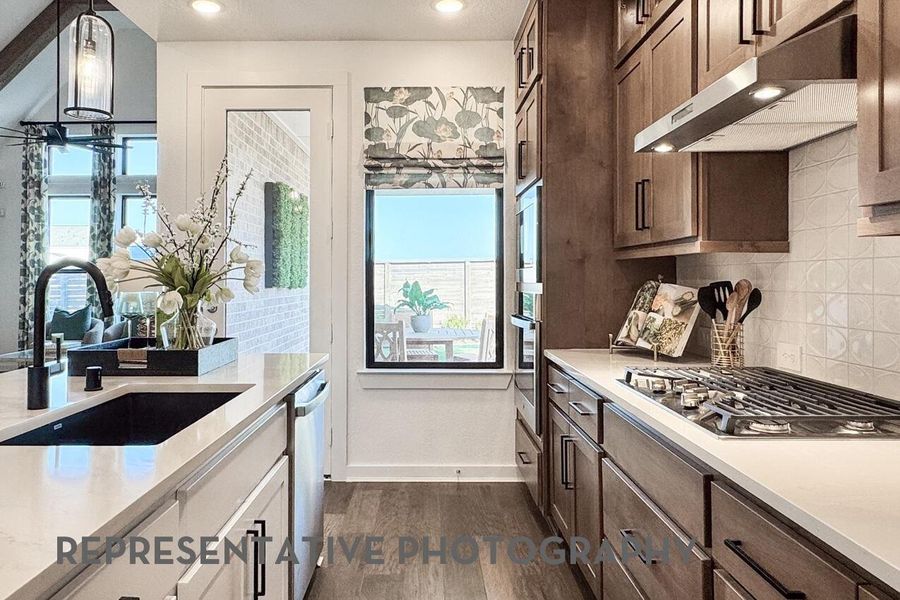 Furnished interior view inside a new home in ARTAVIA, Conroe (Image 5).