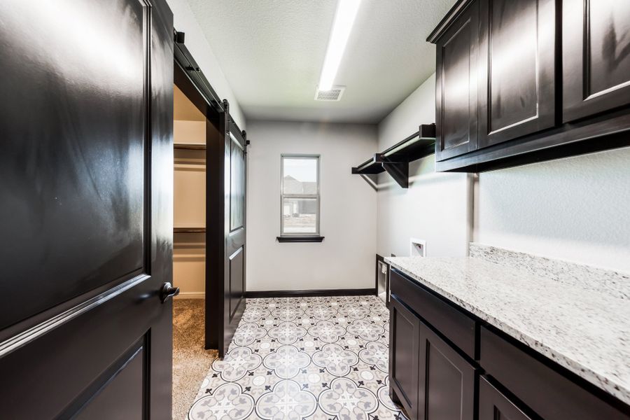 Representative furnished interior of a home built from the The Bennett by Doug Parr Custom Homes in Kessler Farms, Brock (Image 8).