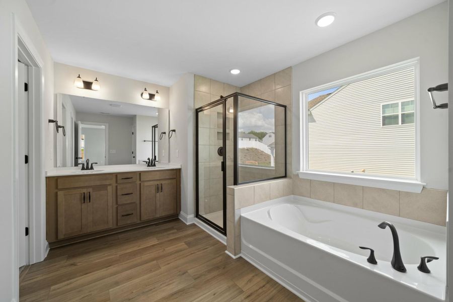 Furnished interior view inside a new home in Cottages at Piper Village, Trinity (Image 12).