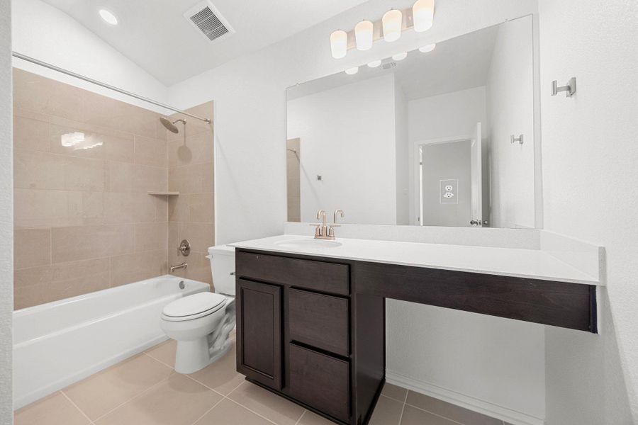 Furnished interior view inside a new home in Salerno - Classic Collection, Round Rock (Image 7). Furnished interior view inside a new home in Salerno - Classic Collection, Round Rock (Image 7).