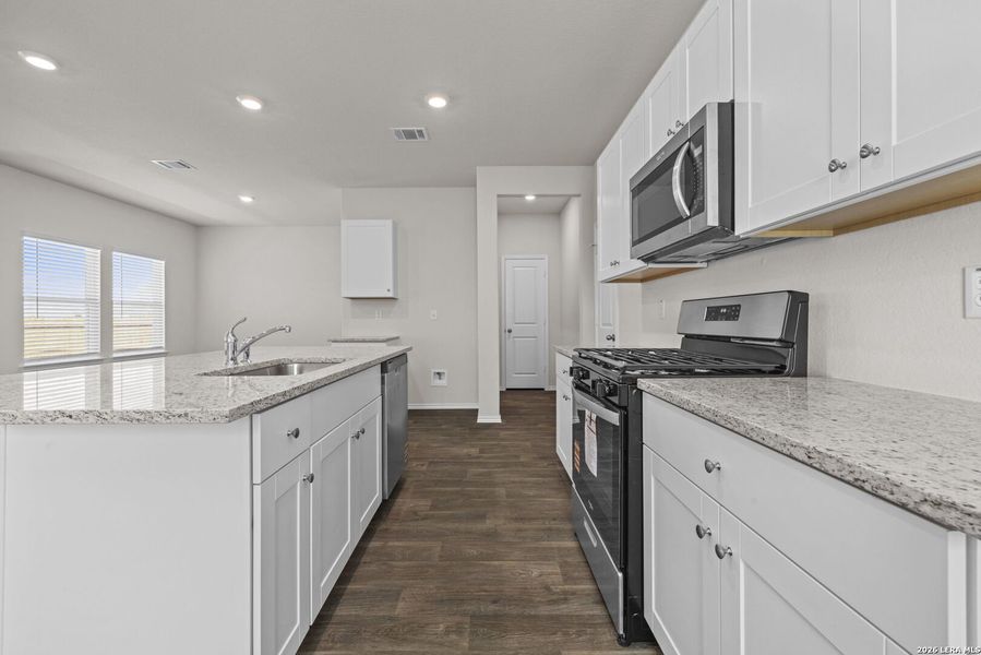 Furnished interior view inside a new home in Riverstone at Westpointe, San Antonio (Image 8).