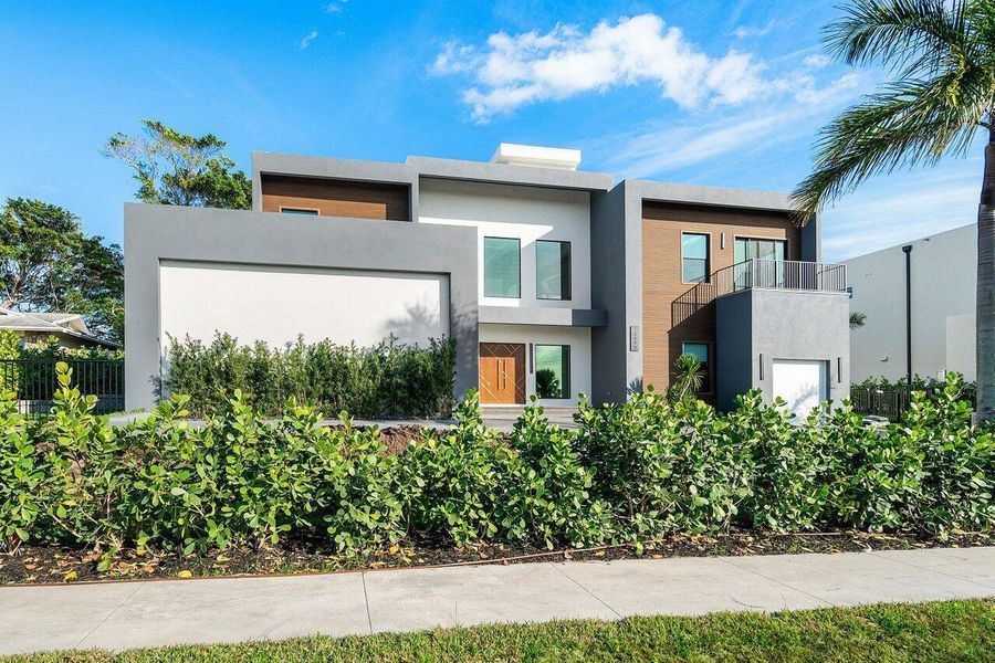 Front exterior of a new home in , Juno Beach, FL, highlighting curb appeal (Image 25).