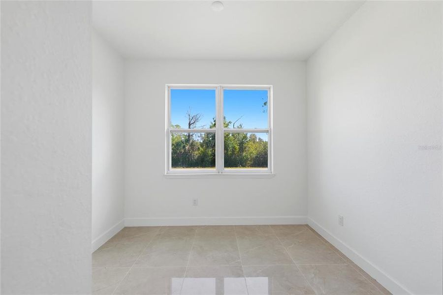 Spacious, unfurnished interior of a new home in , Port Charlotte (Image 41).
