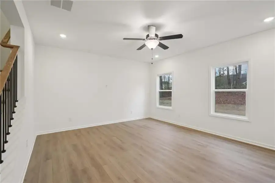 Spacious, unfurnished interior of a new home in Eastlyn Crossing, Flowery Branch (Image 15).