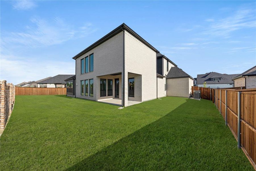 Exterior details and patio area of a home in Estates at Rockhill, Frisco (Image 24). Exterior details and patio area of a home in Estates at Rockhill, Frisco (Image 24).