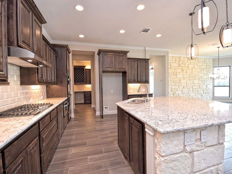 Representative furnished interior of a home built from the San Simeon I by Giddens Homes in Clearwater Ranch, Liberty Hill (Image 247).