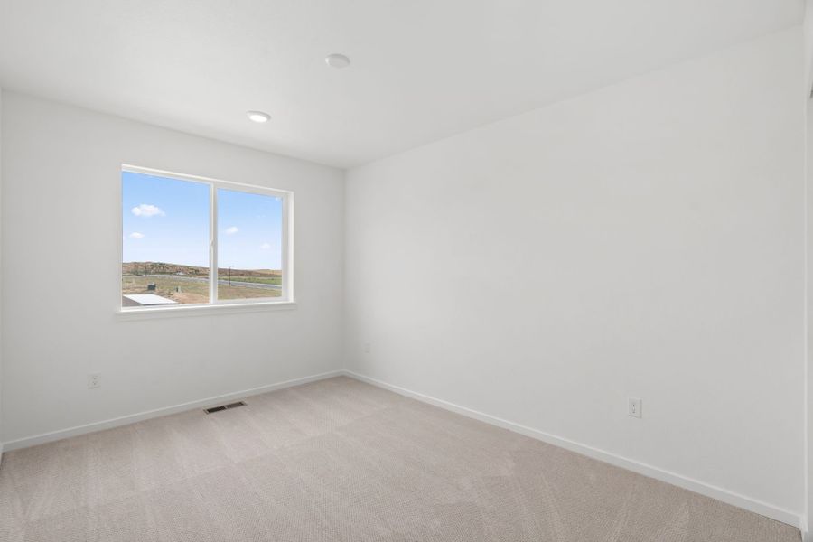 Spacious, unfurnished interior of a new home in Sky Ranch, Watkins (Image 27).