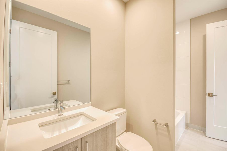 Furnished interior view inside a new home in Apex at Avenir, Palm Beach Gardens (Image 15).