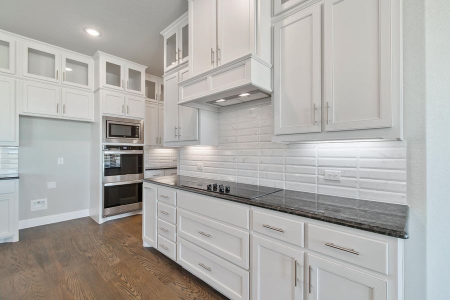 Kitchen | Concept 3634 at Hidden Creek Estates in Van Alstyne, TX by Landsea Homes