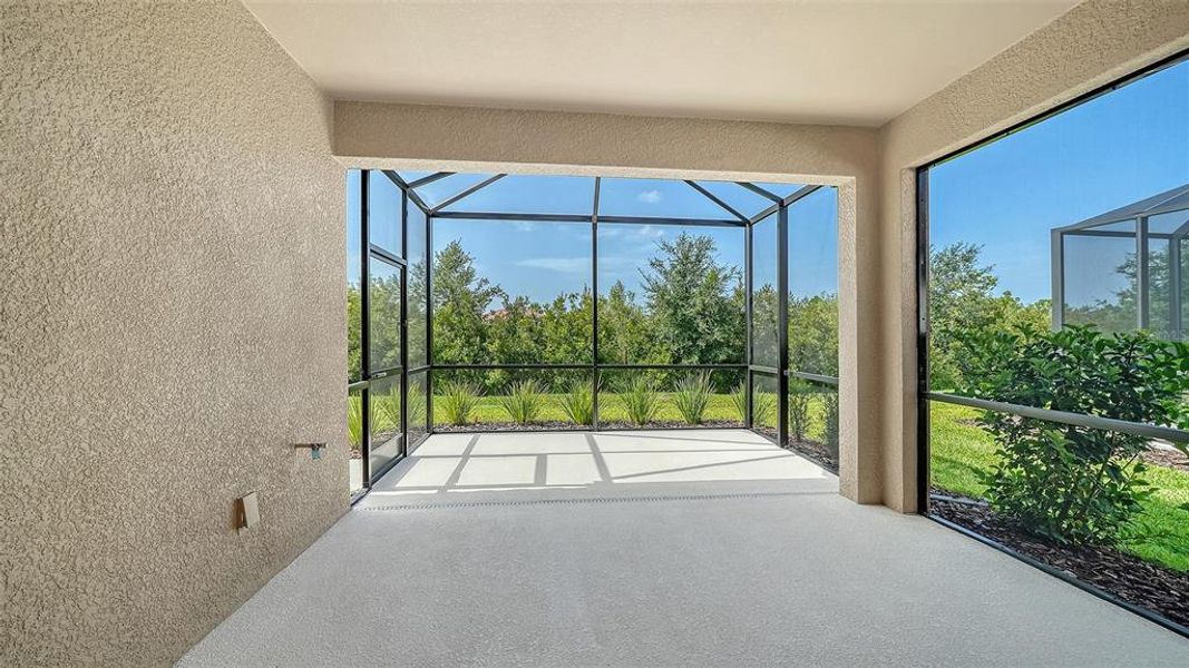 Exterior details and patio area of a home in Vicenza Real Estate and Homes for Sale in North Venice, FL - Neal Communities, Nokomis (Image 20).