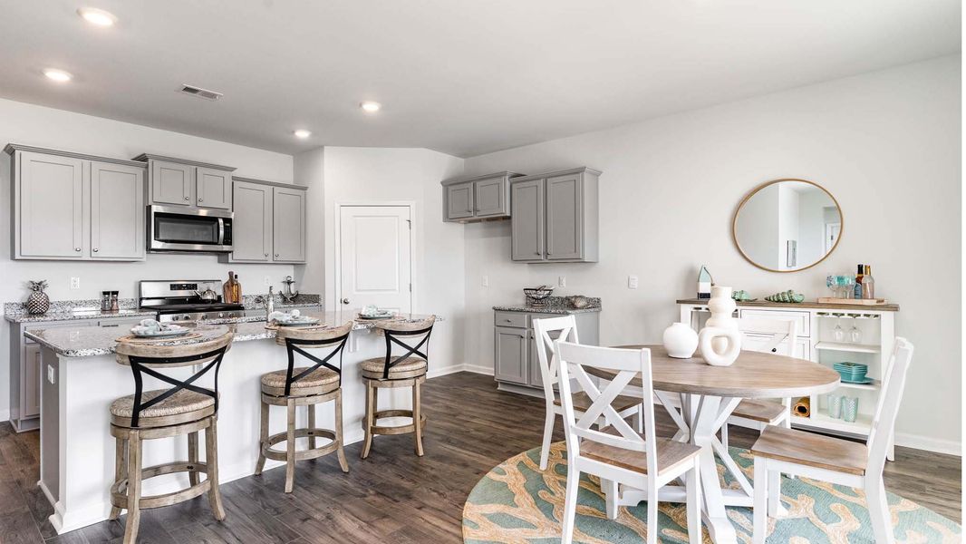 Representative furnished interior of a home built from the CALI by D.R. Horton in Eden Springs, Longs (Image 18).