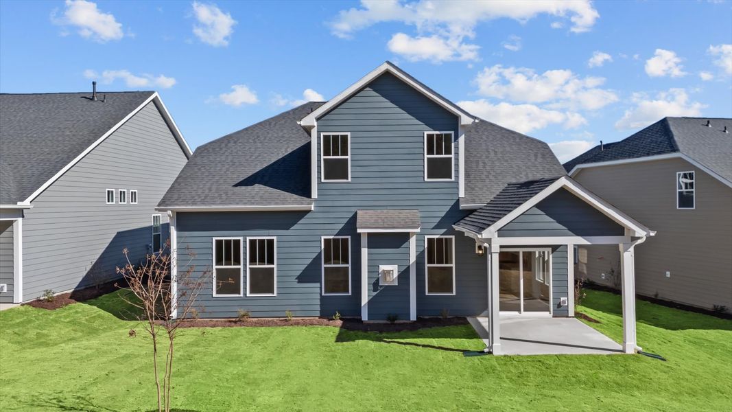 Tasteful rear porch provides a peaceful retreat and effortless indoor-outdoor flow Tasteful rear porch provides a peaceful retreat and effortless indoor-outdoor flow