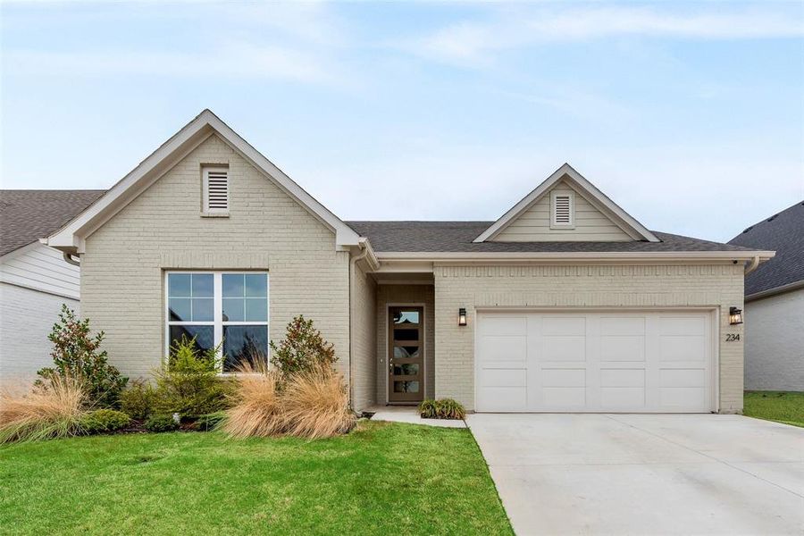 Front exterior of a new home in , Aledo, TX, highlighting curb appeal (Image 21).