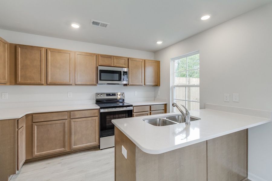 Furnished interior view inside a new home in Padgett Commons, Hopkins (Image 7).