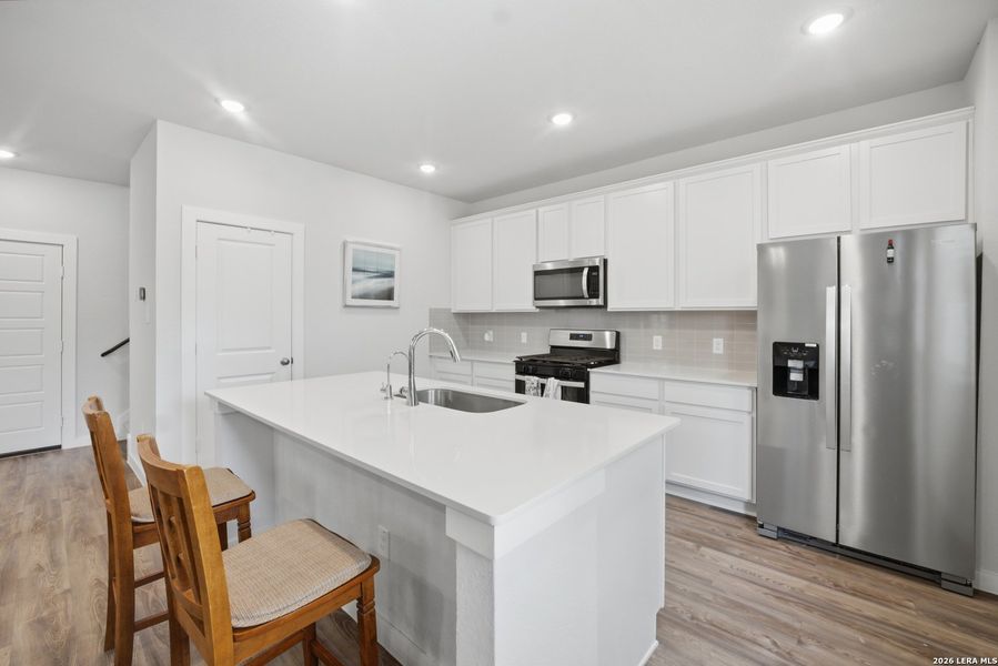 Furnished interior view inside a new home in Senna, San Antonio (Image 11).