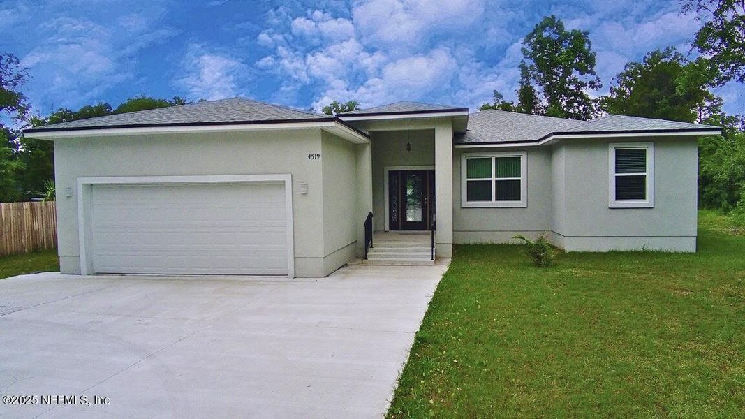 Front exterior of a new home in , Jacksonville, FL, highlighting curb appeal (Image 20).