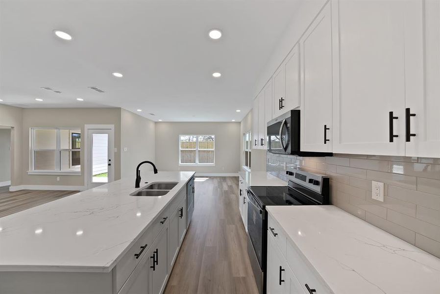 Furnished interior view inside a new home in , The Colony (Image 10).