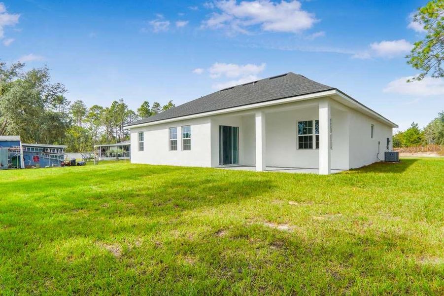 Exterior details and patio area of a home in , Ocala (Image 2).