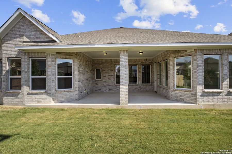 Exterior details and patio area of a home in Stillwater Ranch 60', San Antonio (Image 19).