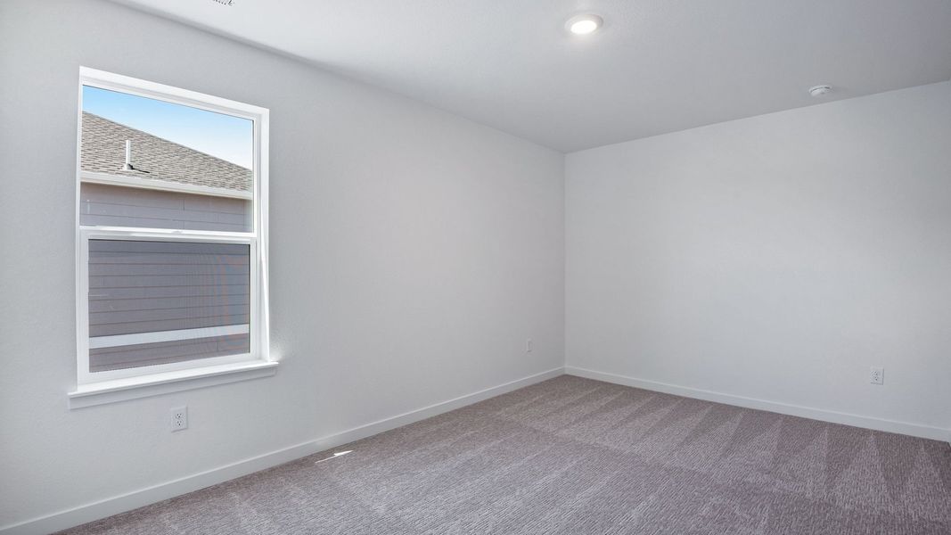 Spacious, unfurnished interior of a new home in Trails at Crowfoot, Parker (Image 39).