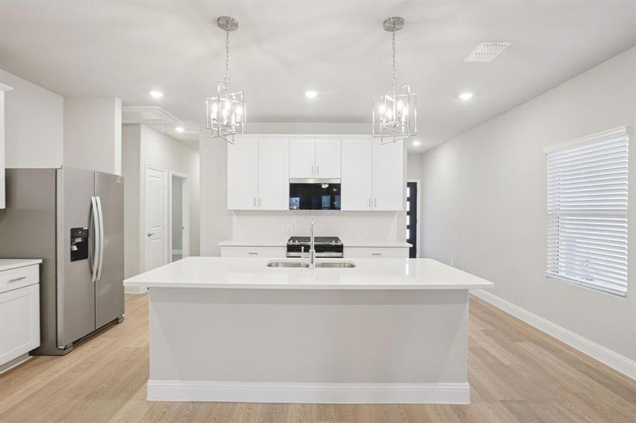 Furnished interior view inside a new home in Parks at Foster Crossing - Spring Series, Anna (Image 6).