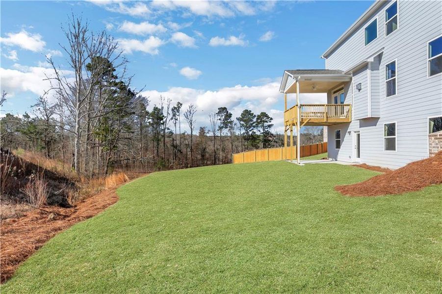 Exterior details and patio area of a home in Cambridge, Flowery Branch (Image 26).