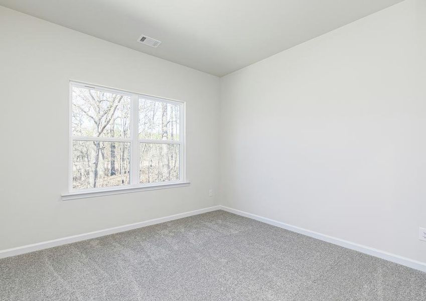 Hop into bed and relax with a new book in this master retreat