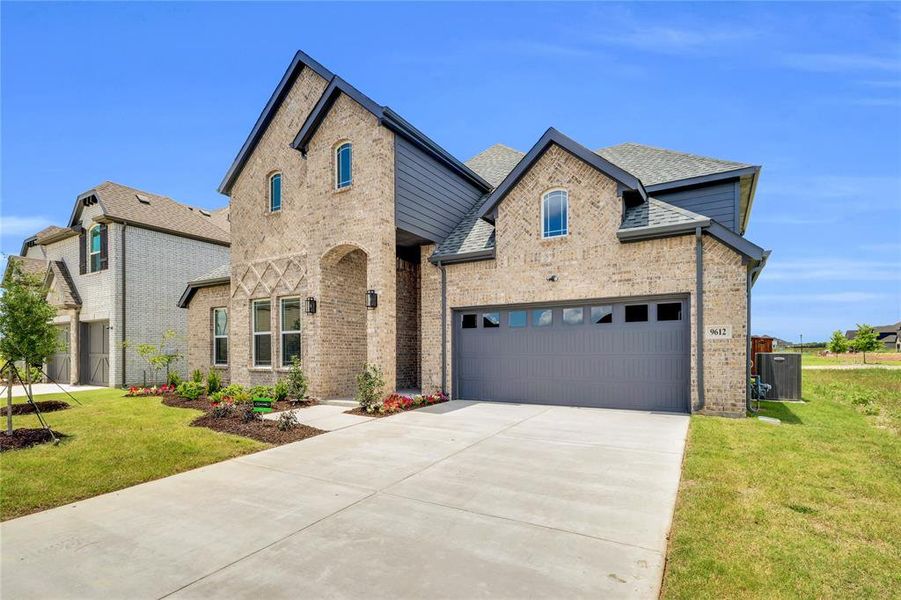 Front exterior of a new home in Polo Ridge, Forney, TX, highlighting curb appeal (Image 1).