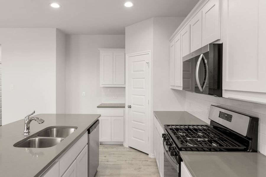 Front exterior of a new home in Northspur, Terrell, TX, highlighting curb appeal (Image 11). Front exterior of a new home in Northspur, Terrell, TX, highlighting curb appeal (Image 11).