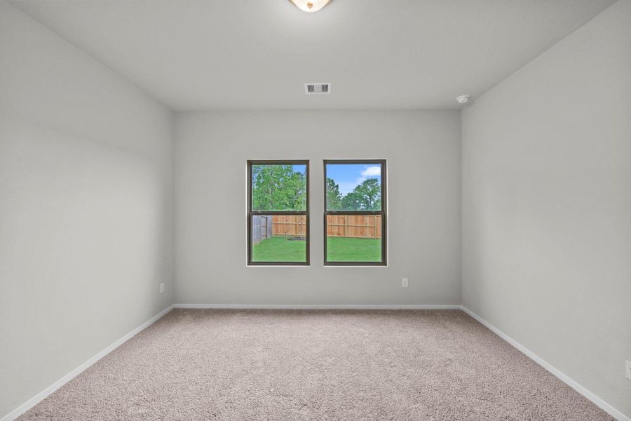 Spacious, unfurnished interior of a new home in Westridge Cove, Conroe (Image 23).