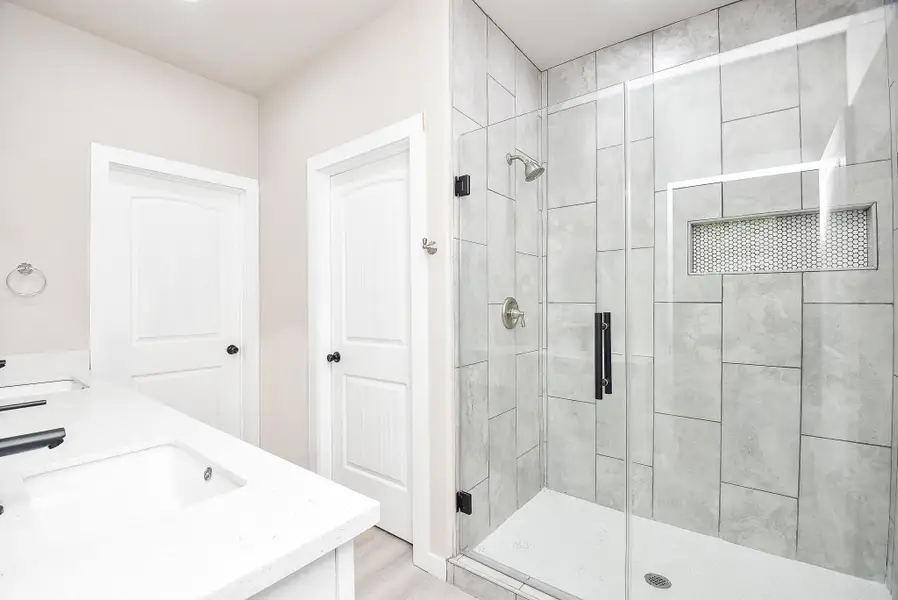 Primary En-Suite Bathroom with Large Shower and Double Sinks Primary En-Suite Bathroom with Large Shower and Double Sinks