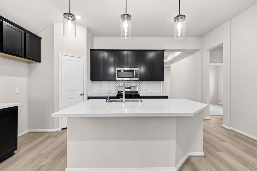 Furnished interior view inside a new home in Grand Central Park, Conroe (Image 6).