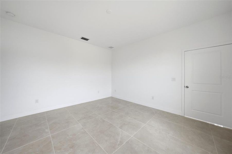 Spacious, unfurnished interior of a new home in , Port Charlotte (Image 37).