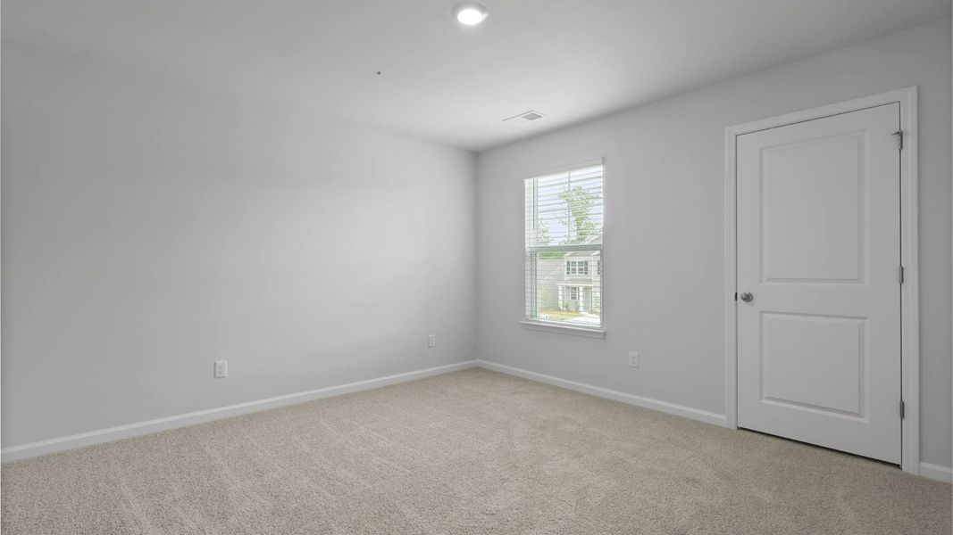 Spacious, unfurnished interior of a new home in Pineview North, Summerville (Image 14).