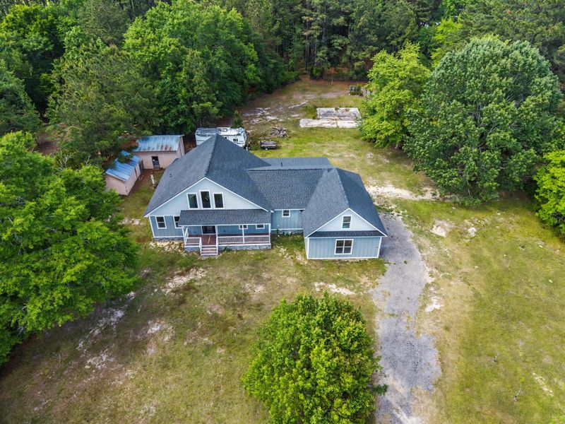 Front exterior of a new home in , Moncks Corner, SC, highlighting curb appeal (Image 24).