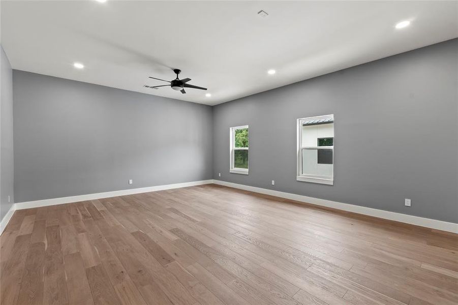 Approx 430 Sq Ft Media Room perfect for movie theater seating or game tables or both!