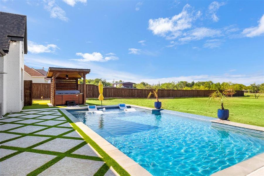 View of swimming pool with a perfect view of the sunsets!